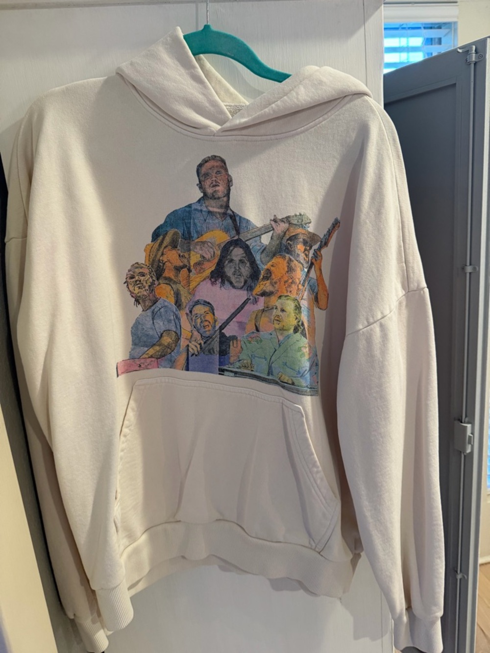 This is a Zach Bryan Quittin' Time Tour cream hoodie - size Small!